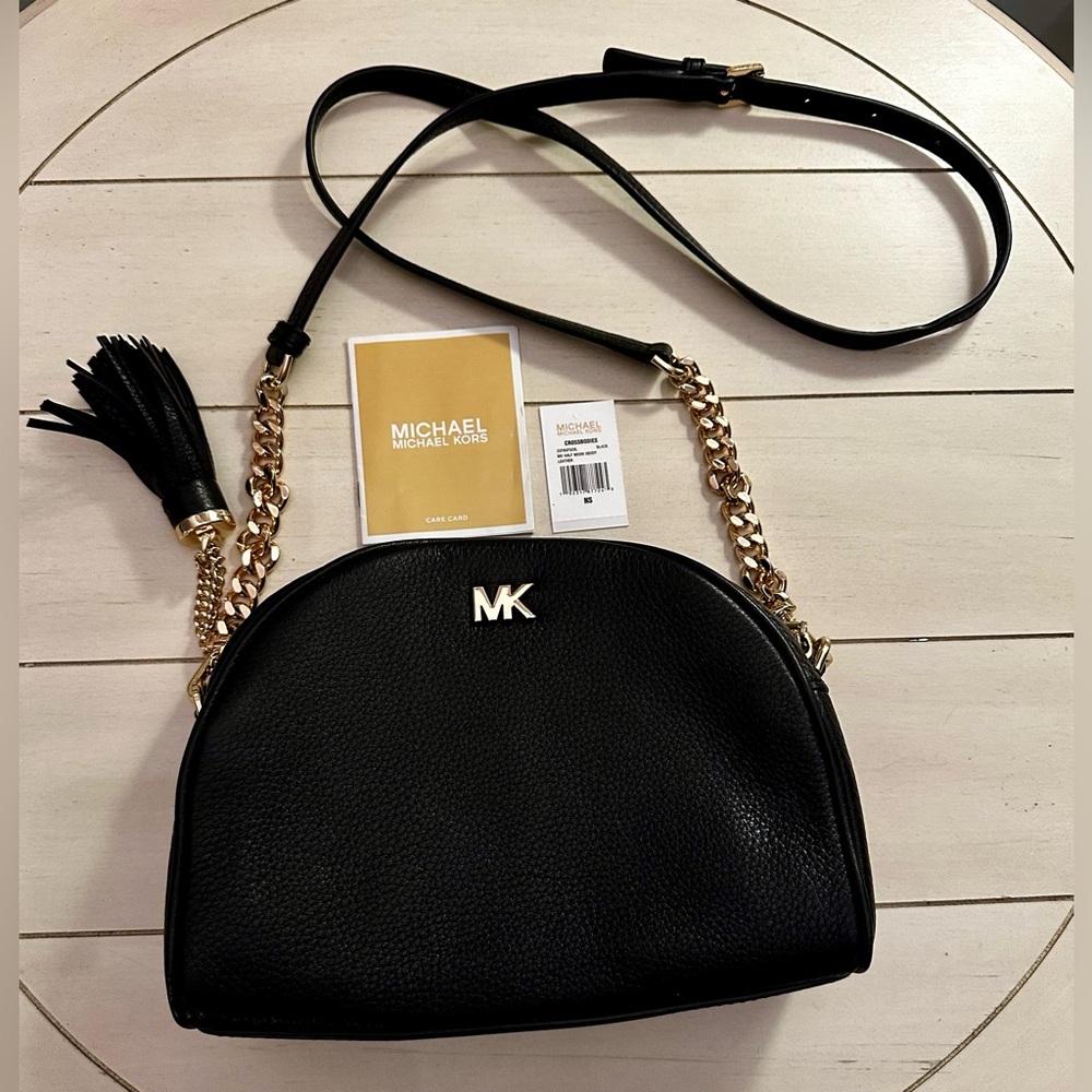 Perfect condition half moon Michael Kors leather crossbody with gold hardware